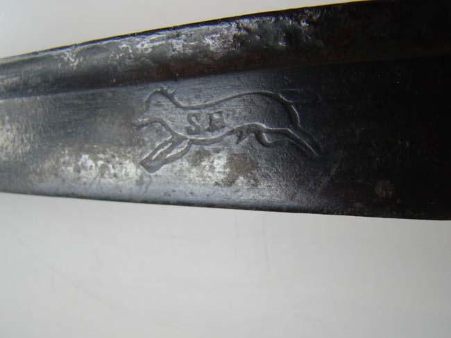 An 18th century English Grenadiers' Basket Hilted Hanger made by Samuel Harvey circa 1750-1768 with engraved heart shaped guard inscribed "M CHESHIRE" and having the Regimental markings 7 and 61. — image 6